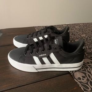 Black and white adidas shoes